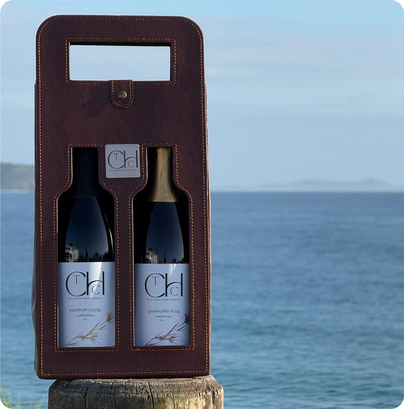 Happy customer holding premium sparkling wine